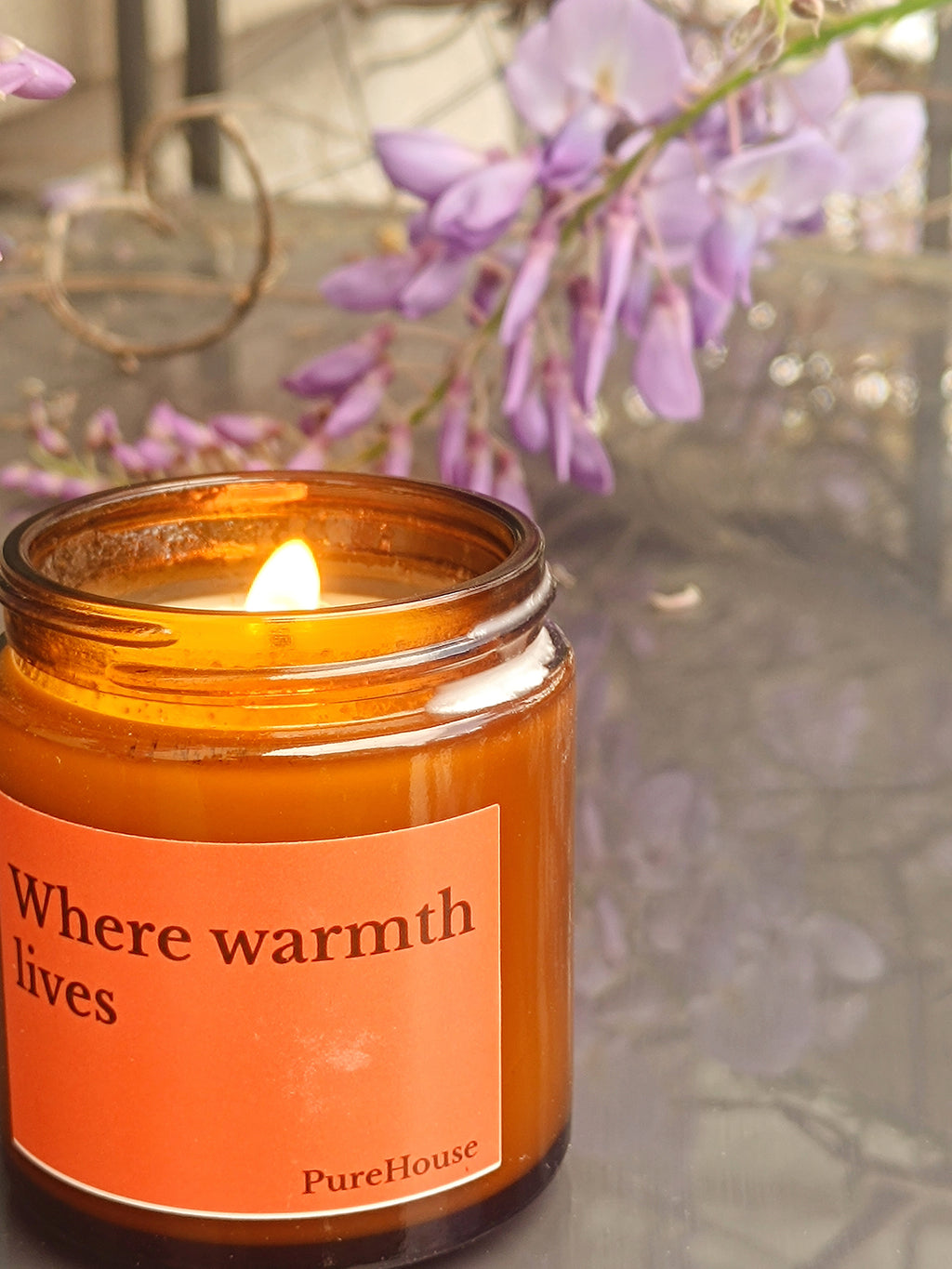 Where warmth lives Soy Candle | Amber Jar with Black lid